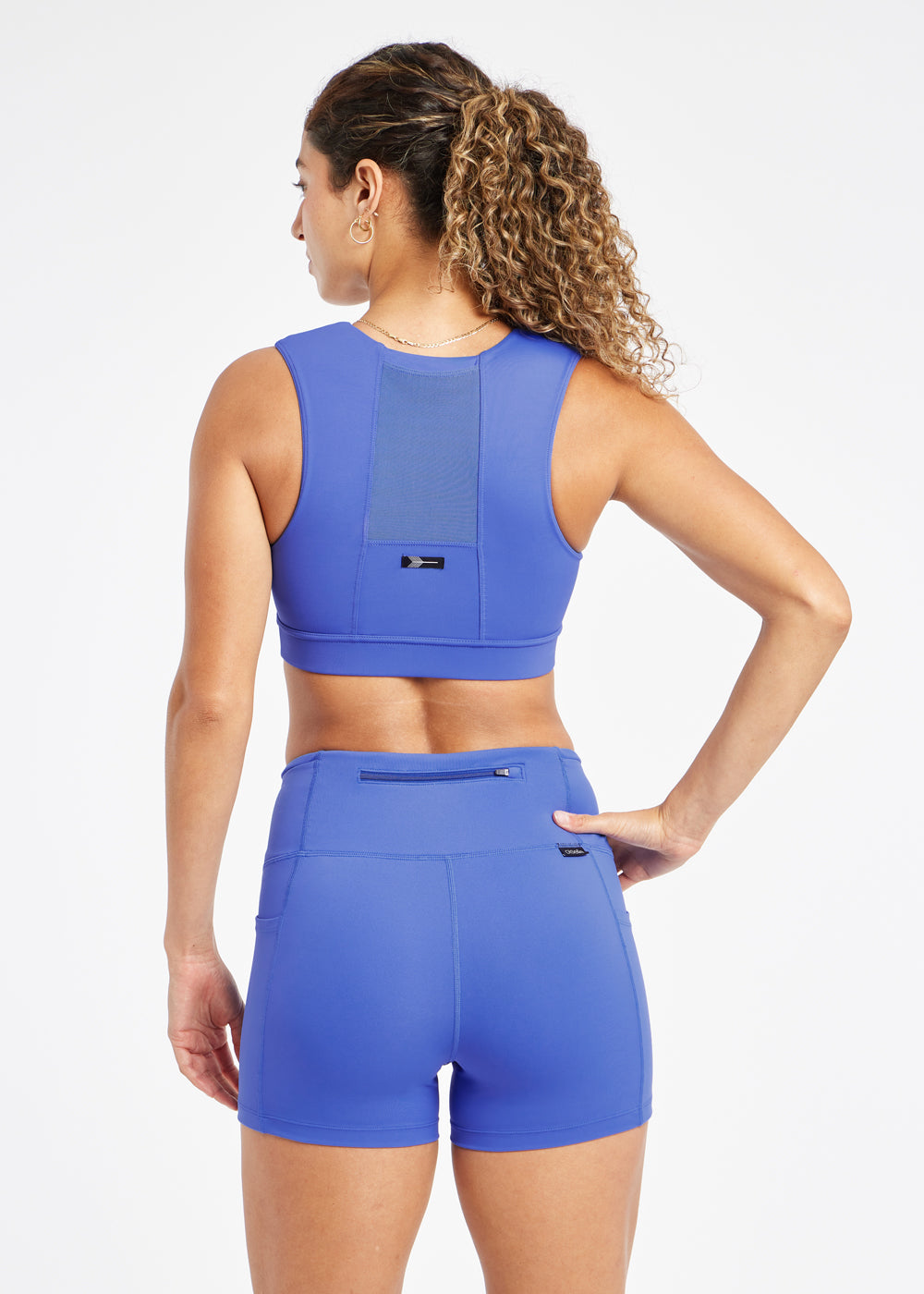 Flyout Sports Bra with pocket in Blue Rapids, back
