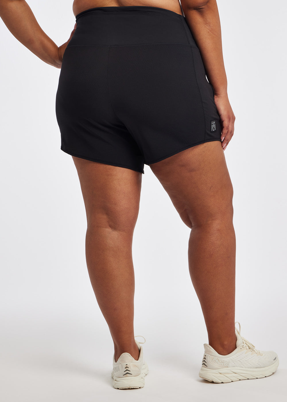 High Rise Roga 6" Running Shorts in Black size 16/18, back view