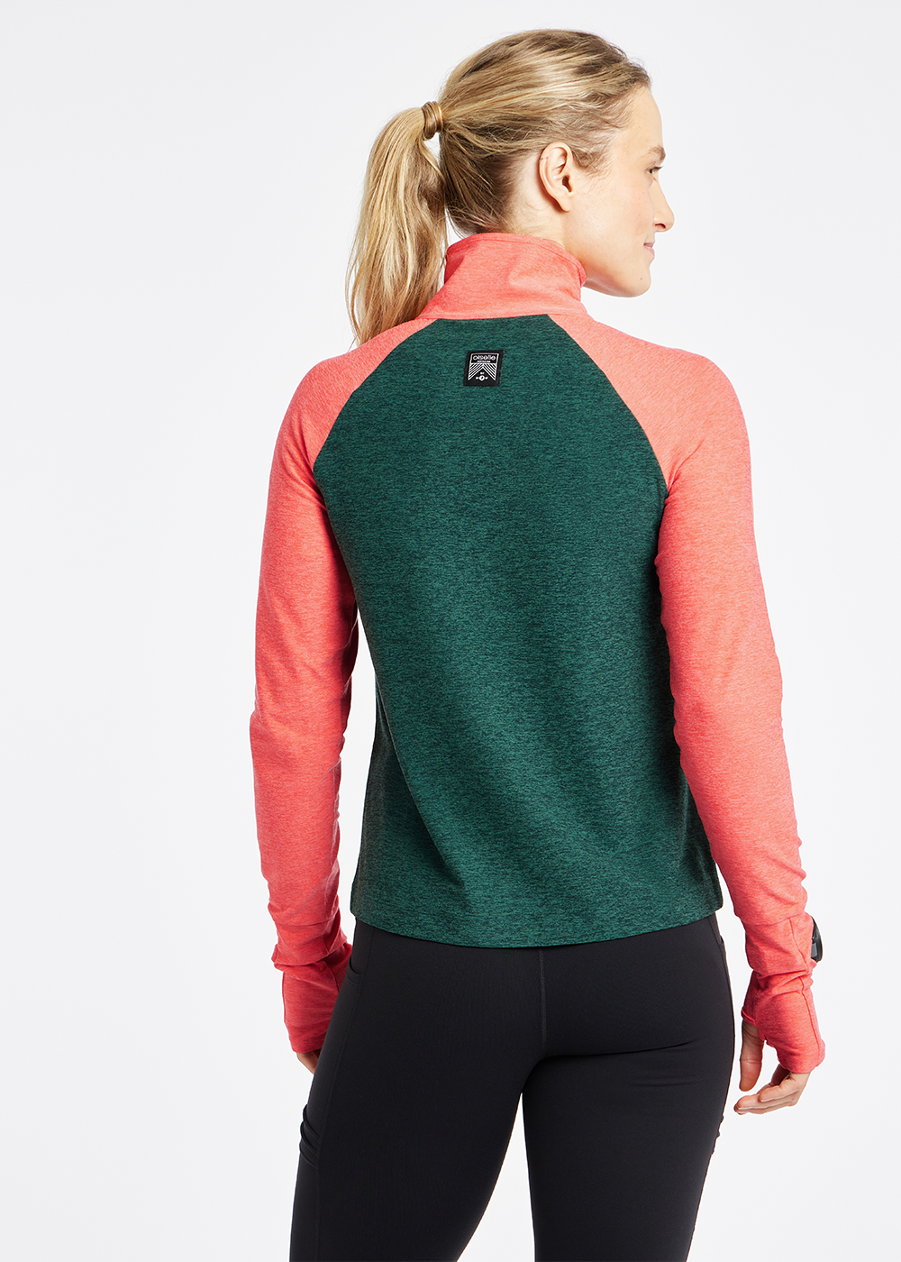 Lux Half Zip Long Sleeve in Juniper Green with orange sleeves, back view