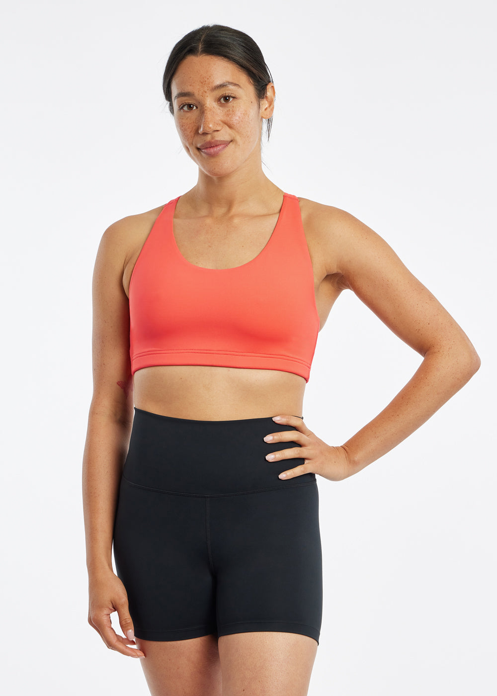 Open Lane Strappy Sports Bra in orange alpenglow, front view