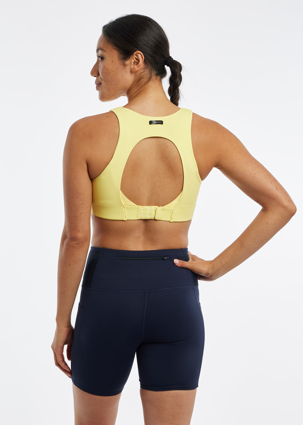 Squared Up Open Back Sports Bra in Rise Light Yellow, back view