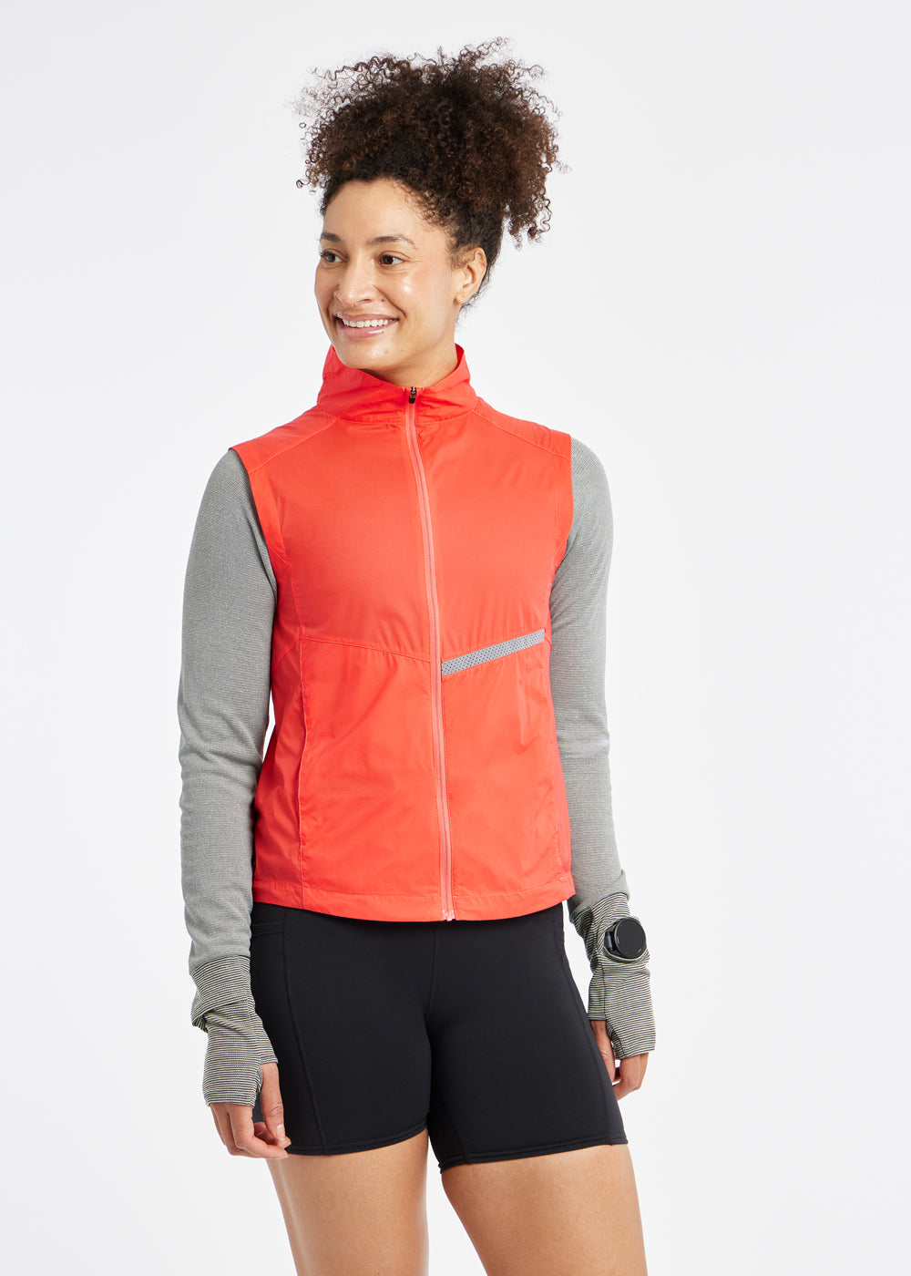 Vigor Packable Running Vest in Alpenglow Orange, front view