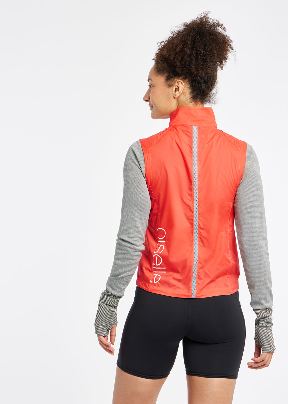 Vigor Packable Running Vest in Alpenglow Orange, back view