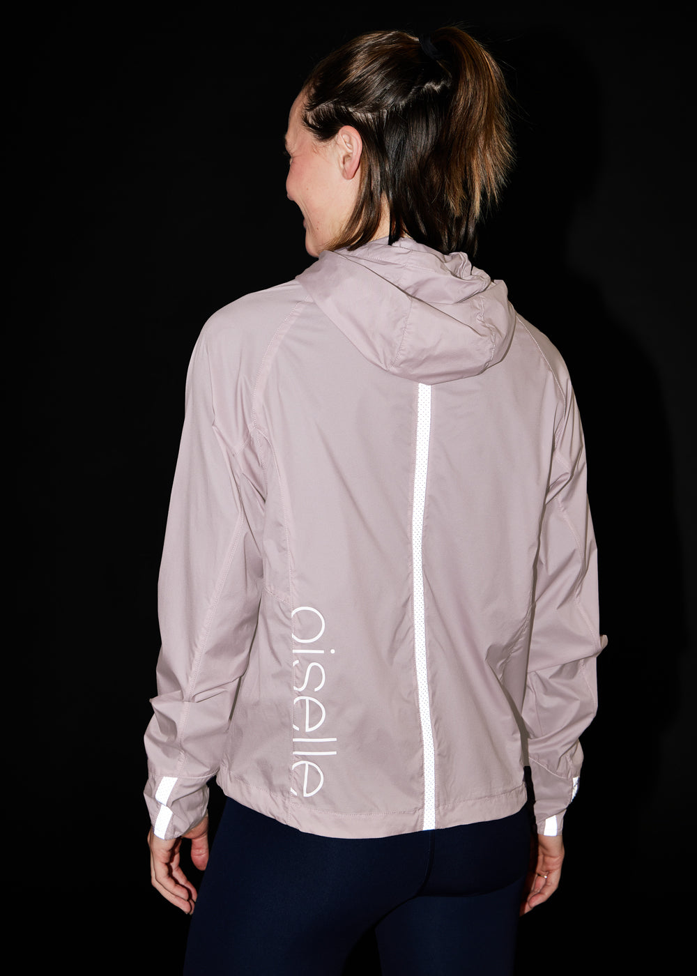 Vim Packable Running Jacket in Dusty Lavender Purple, back view of reflective accents