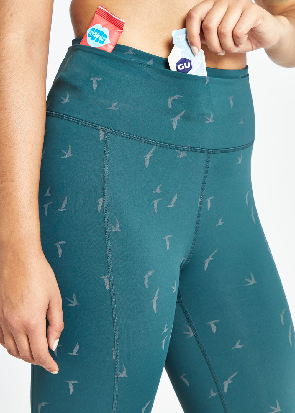 Firecracker Reflective Tights in Juniper green, front pocket details