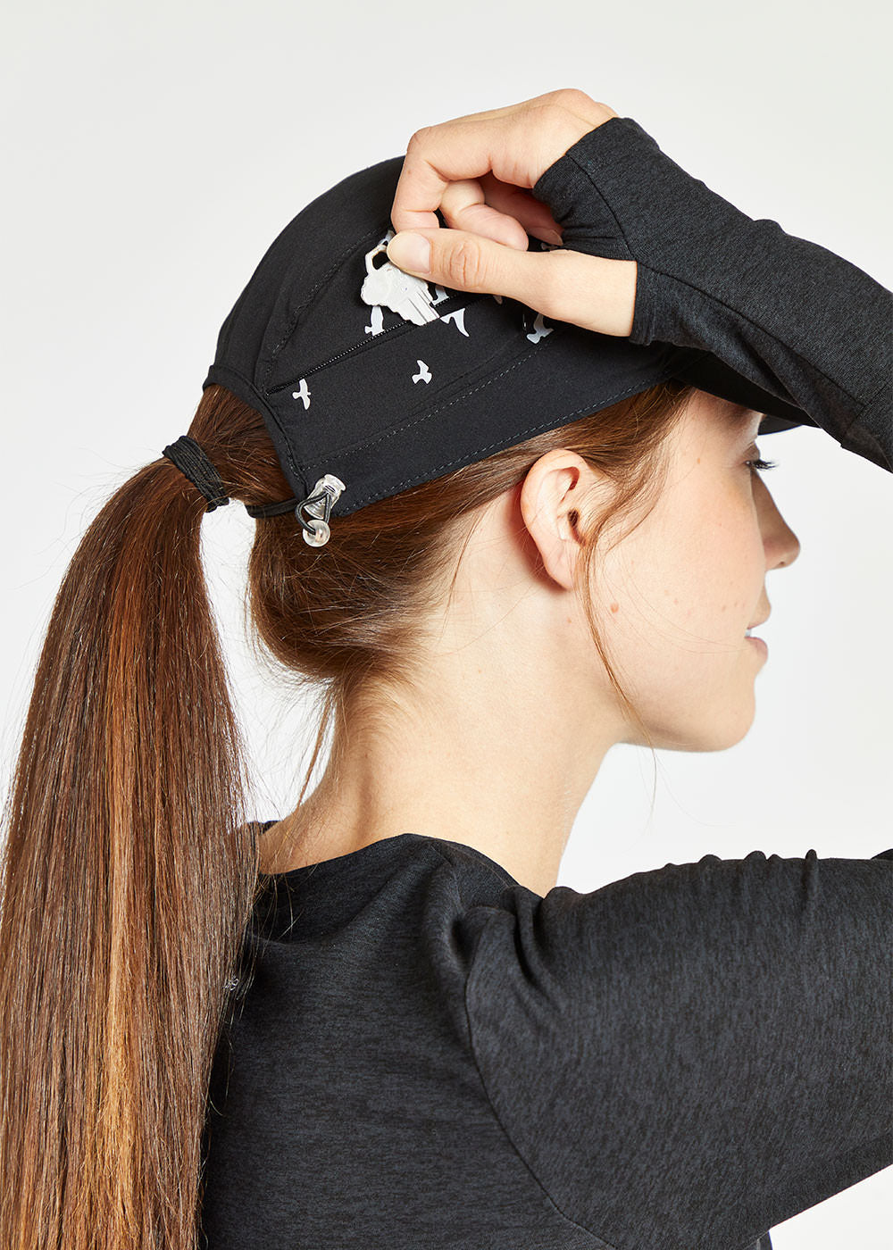 Foldable Roga Running Cap in Black, side zip pocket view